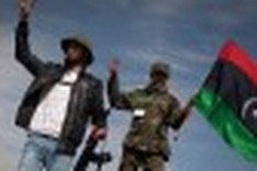 West pounds Libya, Kadhafi vows retaliation