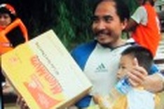 Flood victims smiles begin to shine again