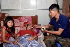 Donations help Dien Bien family rebuild home and fund treatment