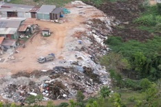 Three charged over illegal dumping of 6,000 tonnes of waste in Daklak