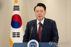 South Korea's Yoon resists questioning over failed martial law bid