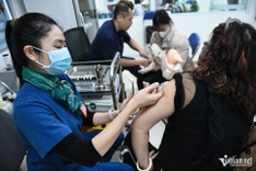 Long queue for flu vaccine in Hanoi