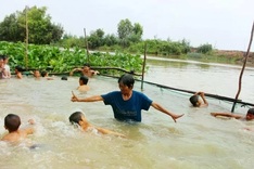 Mekong Delta woman saves lives for decades with free swimming lessons