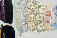 Woman reunited with cash-filled handbag forgotten on train