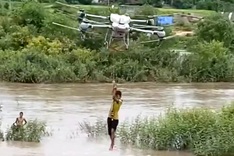 Drone used to rescue two children trapped in floodwaters in Gia Lai