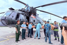 Helicopters and 30,000 soldiers deployed to flood-hit provinces