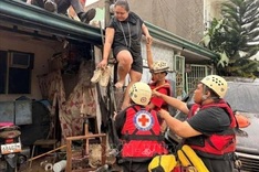 Typhoon flooding kills 26, strands thousands in central Philippines