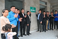 Four low-income Hanoi families receive support to build new homes