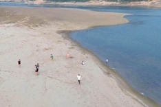 Unusually low water exposes bed of Da River