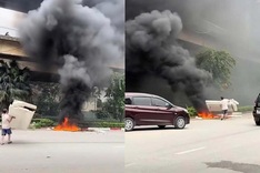 Hanoi man fined for burning waste under Thang Long Bridge