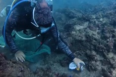 Gia Lai divers scour seabed for rubbish to protect coral reefs