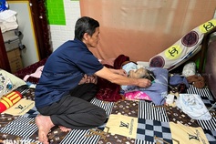 Husband exhausted caring for comatose wife in Dalat