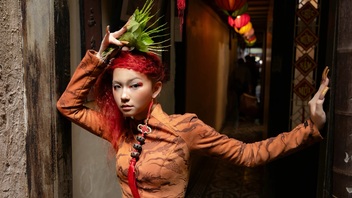 Hanoi fashion creator reimagines ao dai in bold tiger-striped design