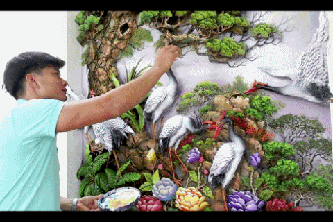 Kỹ sư bỏ nghề lập nhóm đắp phù điêu hút triệu người xem