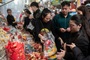 Hanoi Old Quarter confectionery streets packed ahead of Tet