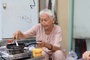 81-year-old banh mi seller charms foreigners with English and French