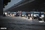 Heavy rain floods Hanoi streets, causes major traffic jams