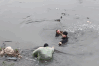 Hanoi men save elderly man from river during chilly weather