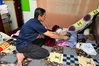 Husband exhausted caring for comatose wife in Dalat